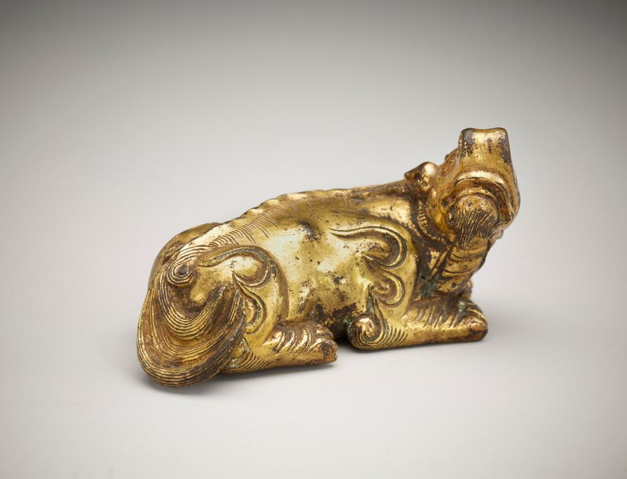 Ornament or weight: a recumbent ch'i-lin